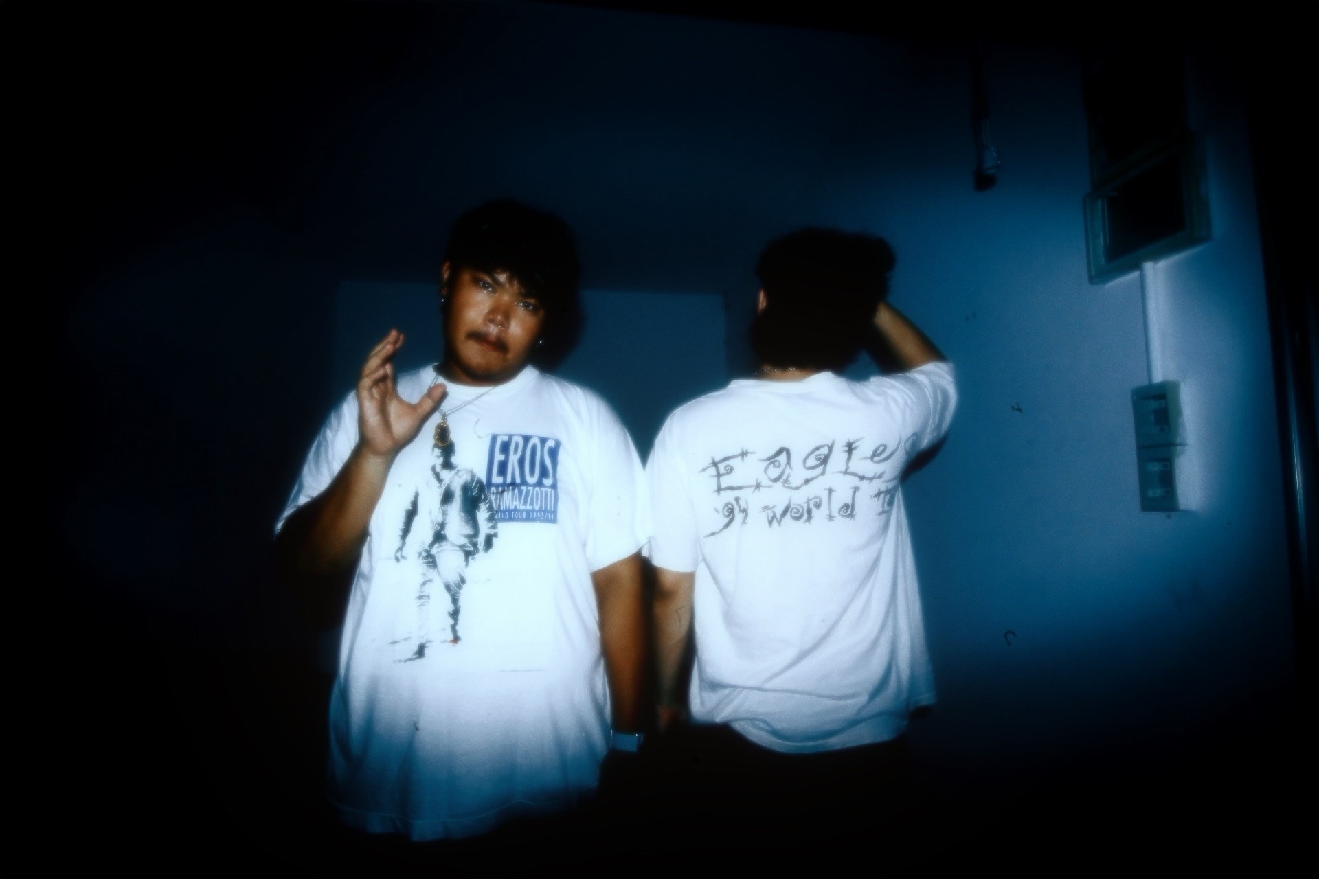 Two friends in white vintage tour tees
